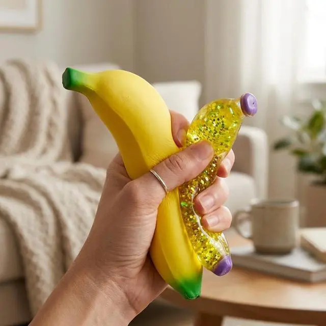 Alt view image 7 of 7 - 2 PCS Banana Squishies, Giant Banana Squishies with Sparkle Glitter, Stress Relief Sensory Tool for Office Desk, Including Jumbo Bananas Stress Ball and Sparkle Bananas Stress Ball, 7'' and 5''
