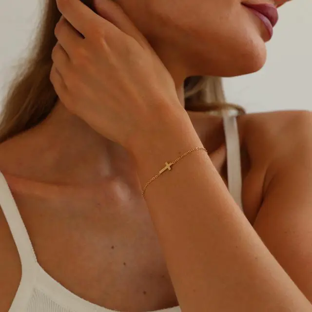 Alt view image 3 of 7 - 18K Gold Plated Tiny Sideways Cross Bracelets for Women Adjustable Simple Gold Thin Religious Charm Bracelet Stainless Steel Dainty Link Chain Bracelet Baptism Jewelry