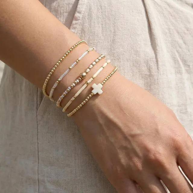 Alt view image 2 of 7 - Gold Beaded Stretch Bracelets Stack for Women - 14k Gold Stackable Elastic Cross Bracelet, White Waterproof Stretchy Seed Beads Jewelry Christian Faith Friendship Summer Beach Mothers Day Gifts