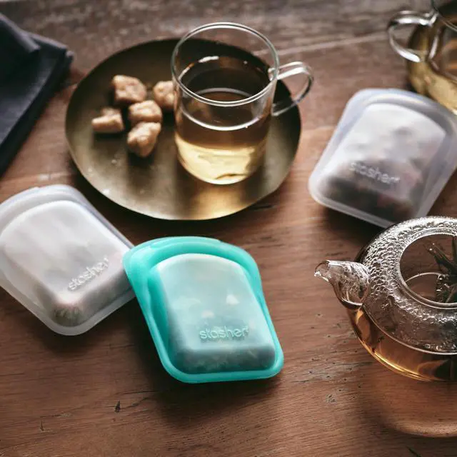 Alt view image 2 of 7 - Silicone Reusable Storage Bag, Pocket Bags 2-Pack, Microwave, Dishwasher, Oven Safe, Sous Vide, Eco Friendly, Leak-free, Food-safe Silicone Snack Bags for Travel, 4 oz, Clear & Aqua
