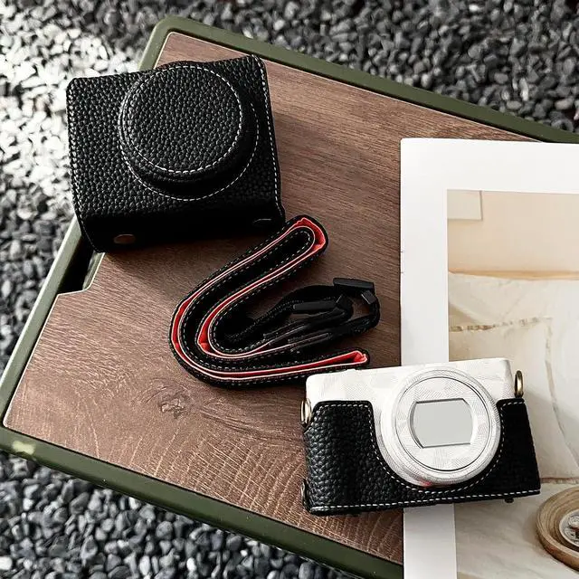 Alt view image 5 of 7 - Camera Protective Case for ZV-, Retro Leather Camera Bag with Hand Grip & Tripod Mount, Bottom Access & Shoulder Strap (Black)