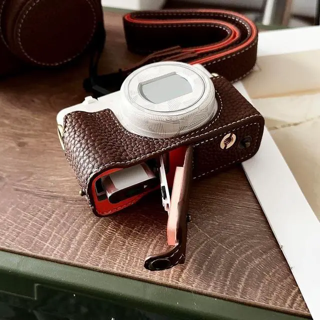 Alt view image 3 of 7 - Camera Protective Case for ZV-, Retro Leather Camera Bag with Hand Grip & Tripod Mount, Bottom Access & Shoulder Strap (Coffee Color)