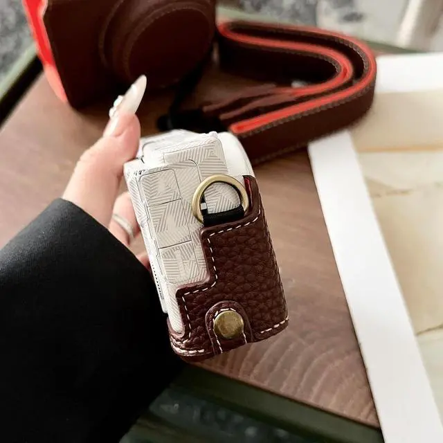Alt view image 7 of 7 - Camera Protective Case for ZV-, Retro Leather Camera Bag with Hand Grip & Tripod Mount, Bottom Access & Shoulder Strap (Coffee Color)