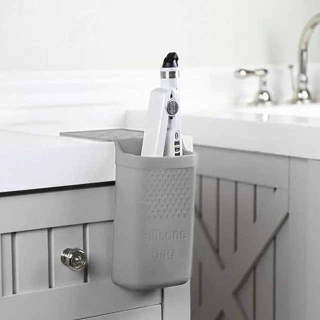 Alt view image 2 of 7 - Wall Mounted Hair Tool Organizer | Silicone Heat Pouch Holder For Curling Iron Flat Iron (Grey)