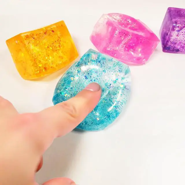 Alt view image 5 of 6 - 4pcs Glitter Ice Cubes - Colorful Sensory Fidget Toys for Adults & Kids, Fun Squeeze Ball for Stress Relief, Holiday and Birthday Gifts, Perfect Party Toy Gift, Easter Basket Gift