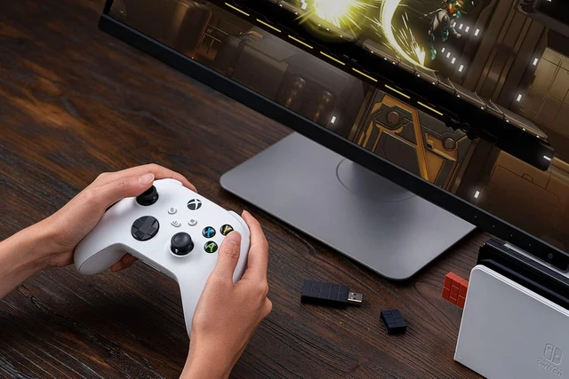Alt view image 6 of 7 - 8BitDo Wireless USB Adapter 2 for Switch 2, Windows PC, Mac & Raspberry Pi, Compatible with Xbox Series X & S Controller, Xbox One Bluetooth, Switch Pro and PS5 Controller (Black) USB Adapter 2 brown