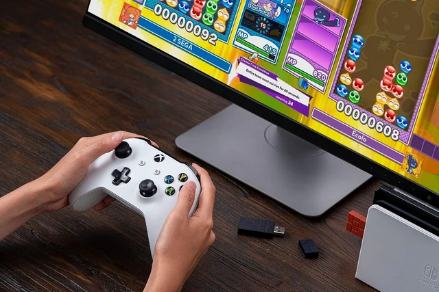 Alt view image 2 of 7 - 8BitDo Wireless USB Adapter 2 for Switch 2, Windows PC, Mac & Raspberry Pi, Compatible with Xbox Series X & S Controller, Xbox One Bluetooth, Switch Pro and PS5 Controller (Black) USB Adapter 2 brown