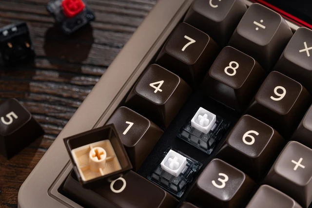 Alt view image 4 of 7 - 8Bitdo Retro 18 Mechanical Numpad for Windows & Android, C64 Edition
Bluetooth, 2.4G and Wired, Calculator Mode, Retro LED Display, Kailh Box White Switches V2