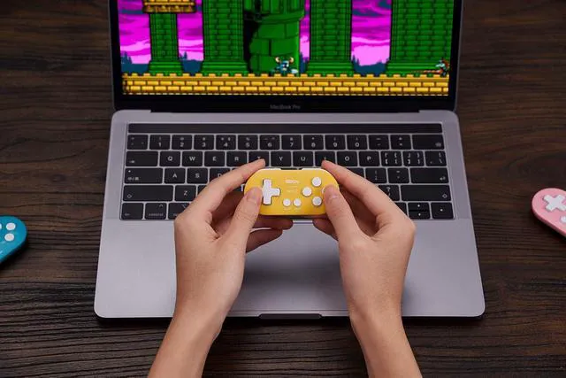Alt view image 4 of 7 - Zero 2 Bluetooth Key Chain Sized Mini Controller for Nintendo Switch 1/2, Windows and Android (Yellow Edition)