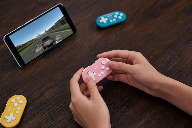 Alt view image 2 of 5 - Zero 2 Bluetooth Key Chain Sized Mini Controller for Nintendo Switch 1/2, Windows and Android (Pink Edition)