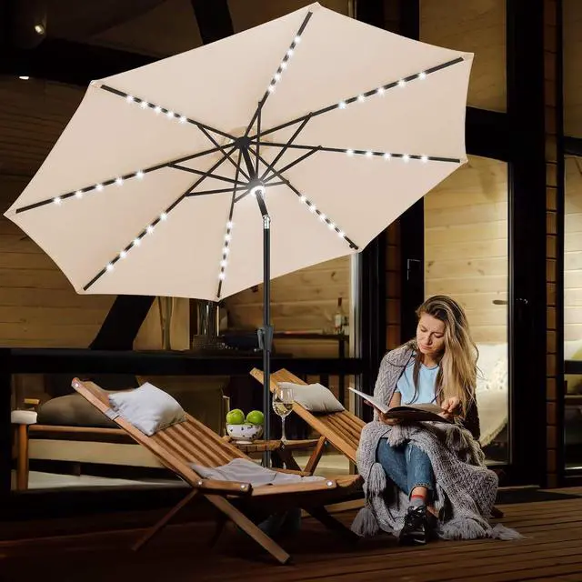 Alt view image 6 of 7 - FLAME&SHADE Solar Patio Umbrella with a Centre Light, 9 FT Beige | 40 LED Lights, UV Protection, Waterproof, Porch Deck Outdoor Umbrella for Pool, Backyard, Garden, Provides Evening Lighting