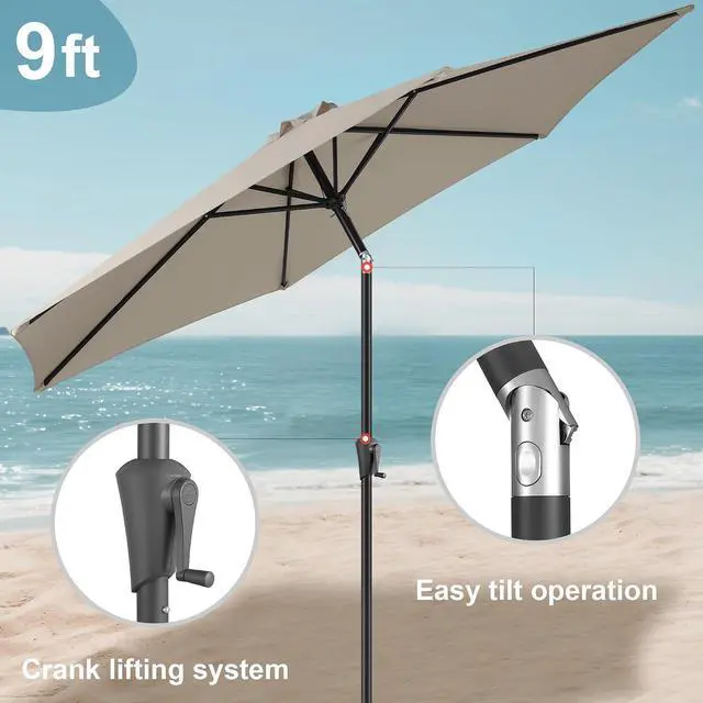 Alt view image 7 of 7 - FLAME&SHADE Patio Umbrella Outdoor with Push Button Tilt, 9 ft Taupe | UV Protection, Waterproof, Porch Deck Umbrella for Pool, Lawn, Table, Garden, Backyard, Provides Shade