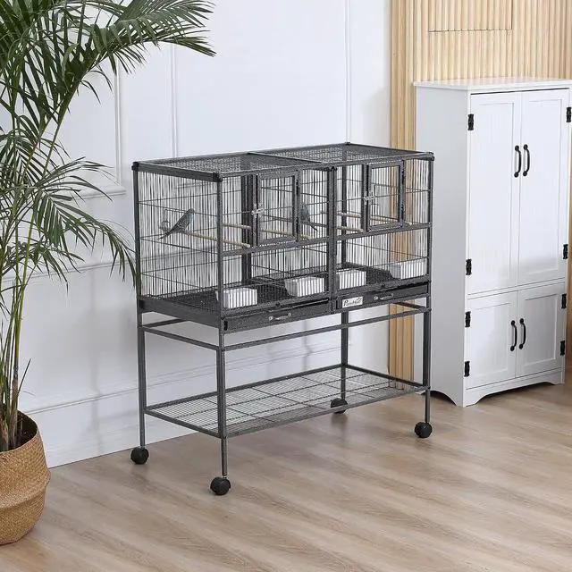 Alt view image 2 of 7 - PawHut Divided Breeder Bird Cage with Rolling Stand Removable Metal Tray | Storage Shelf, Wood Perch, Food Container