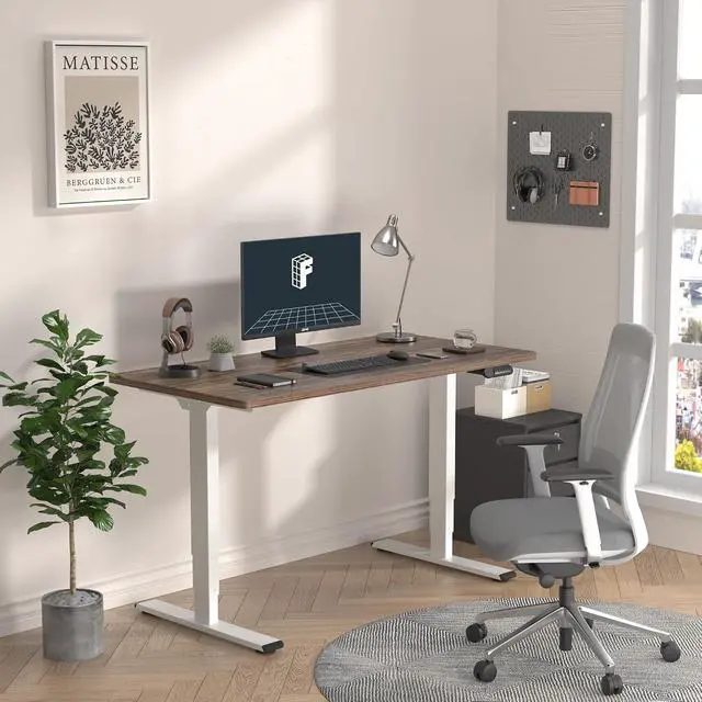 Alt view image 2 of 7 - E6 3-Stage Dual Motor Electric Standing Desk 55 x 28 Sit Stand Up Desk, Holds 220 lbs, Adjustable Height w/Memory Presets, One-Piece Brown Wood Grain Desktop & White Frame, Ships in 2 Boxes
