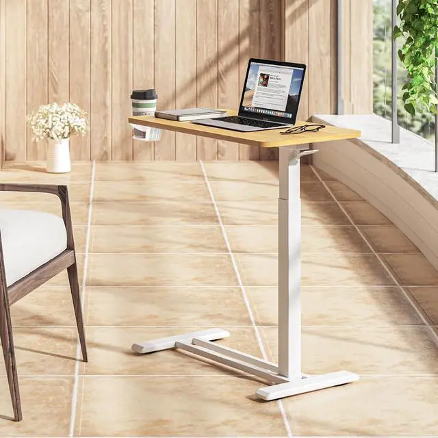 Alt view image 6 of 7 - Mobile Standing Desk with Hidden Wheels,Pneumatic Laptop Desk Rolling Computer Cart Movable Height Adjustable Small Sit Stand Desk for Home Office(27.6" W x 15.7" D,Maple)