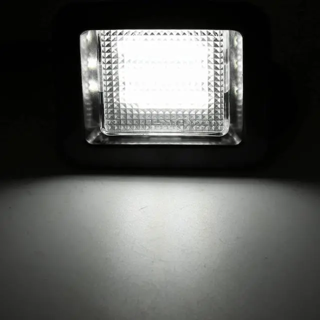 Alt view image 2 of 7 - Yankok LED License Plate Lights Compatible with Ford F150 All Models 2015-2020 and F150 Raptor 2017-2020 Thirteenth Generation Black Panel with Clear Lens 6500K 18 SMD Tag Lamp Assembly