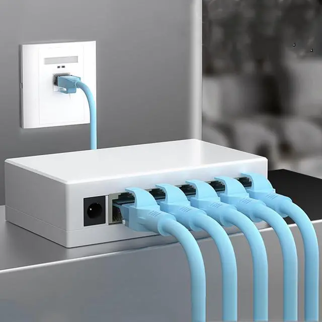 Alt view image 6 of 7 - Yankok 5 Port Gigabit Ethernet Switch 10/100 Mbps Unmanaged Auto-Negotiation RJ45 Ports White Plastic Case Desktop Ethernet Splitter Plug and Play