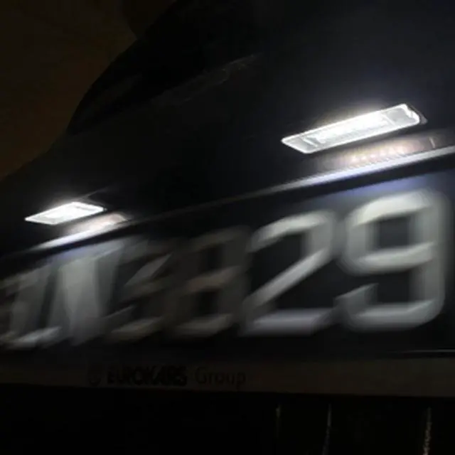 Alt view image 7 of 7 - Yankok LED License Plate Lights for Mini Cooper R56 R57 R58 R59 Hardtop Convertible Coupe Roadster 6000K 18 SMD Can-bus Error Free Tag Lamp Assembly