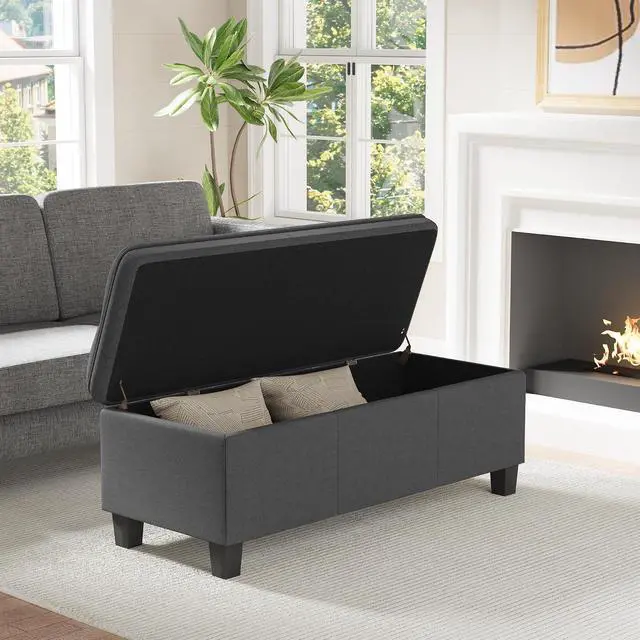 Alt view image 3 of 7 - 47 Inches Storage Ottoman with Legs, End of Bed Bench, Foot Rest for Couch, for Living Room, Bedroom, Entryway, 17.3" D x 47.2" W x 18.5" H, Easy Assembly (Dark Gray)