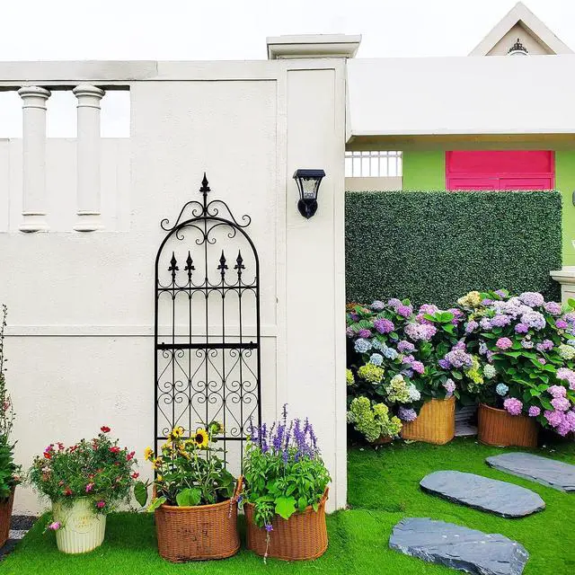 Alt view image 4 of 7 - Garden Trellis for Climbing Plants, 70" H x 21.7" W Heavy Duty Metal Trellis, 6FT Rustproof Black Iron Vine Support Trellis with 9.2" Ground Stakes, Decorative Cupid Arrow Design Roses, Vines