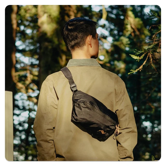 Alt view image 7 of 7 - Outdoor Sling 4L, Black, Padded Adjustable Shoulder Strap for Crossbody & Waist Carry, 3 Mesh Internal Pockets, Ideal for Carrying Cameras & Essentials, Versatile Sling Bag for Men & Women