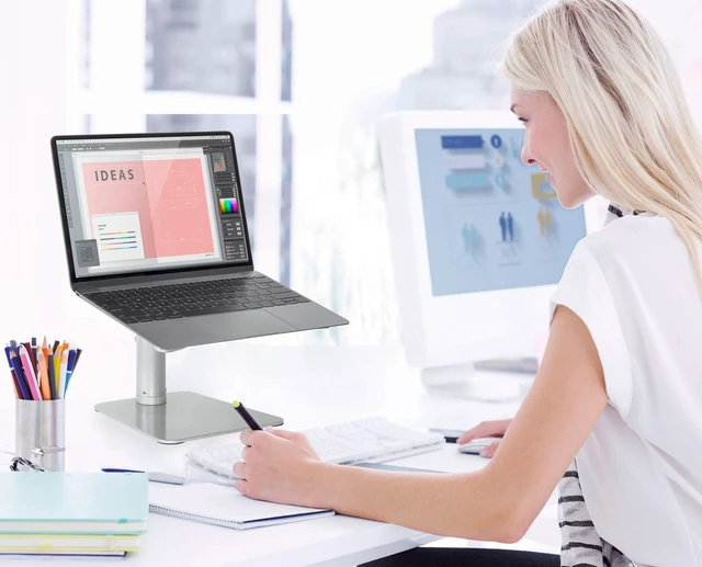Alt view image 2 of 7 - Adjustable Laptop Stand for Desk, Tilted MacBook Stand, 33 lb Fits 11-15 in, 4.7-6.7 in lift, fixed angle, open center frame, Steel, 10.5 x 10.1 in shelf, 8.1 x 7.3 in base, knob lock