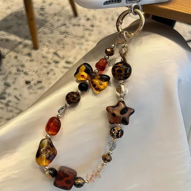 Alt view image 2 of 7 - Phone Charm with Crystal/Handpainted Bead, Kawaii Hands-Free Wrist Strap for Women Girl, Cute Star & Bow Leopard Print Shell Bead, Luxury Bling Diamond Glitter Beaded, Phone Lanyard