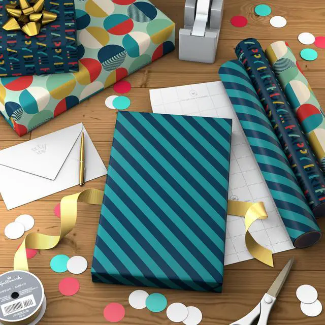 Alt view image 3 of 7 - Hallmark Birthday Wrapping Paper Mini Rolls, 3-Pack (Navy Blue and Teal Stripes, Orange and Yellow Mod Circles) for Graduations, Father's Day, Easter, Any Occasion - 60 Sq. Ft. Total