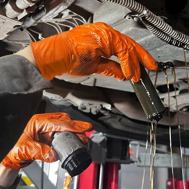 Alt view image 5 of 7 - TitanFlex Heavy Duty Orange Nitrile Gloves, 6 Mil, Raised Diamond Texture, Mechanic Disposable Gloves, Latex Free Powder Free