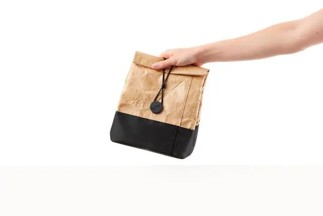 Alt view image 6 of 7 - Kraft To-Go Lunch Bag | Brown | 1 Gallon | Large Rolltop Reusable Meal Carrier with Room for Bottle & More | Kraft-Paper Style, Waterproof & Stain-Resistant, Insulated Lining
