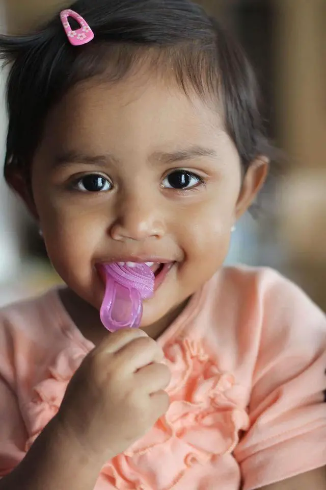 Alt view image 7 of 7 - Oral Care Babys First Toothbrush, Smooth Silicone Bristles Gently Clean Tender Teeth and Gums, for Ages 4+ Months, Clear, 2 Pack