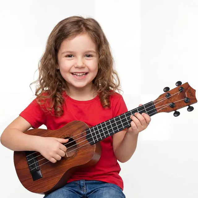 Alt view image 7 of 7 - Raimy 17in Kids Ukulele Mini Guitar with Picks for Toddler Boys Girls | 4 Strings Children Musical Instruments, Educational Toys, Beginner Birthday Gift, Easy Strumming and Learning Fun (Mahogany)