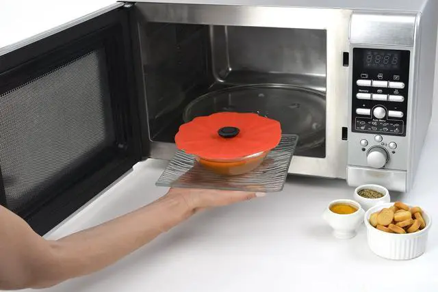 Alt view image 5 of 7 - Poppy Silicone Lid for Food Storage and Cooking - Airtight Seal on Any Smooth Rim Surface - BPA-Free - Oven, Microwave, Freezer, Stovetop and Dishwasher Safe (6 Inch)