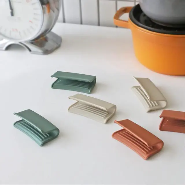 Alt view image 7 of 7 - Silicone Pot Holders, Heat Resistant Pot Handle Covers for Kitchen, Accessories for Cast Iron or Ceramic Dutch Ovens, 1 Pair (2 pcs) - Cream