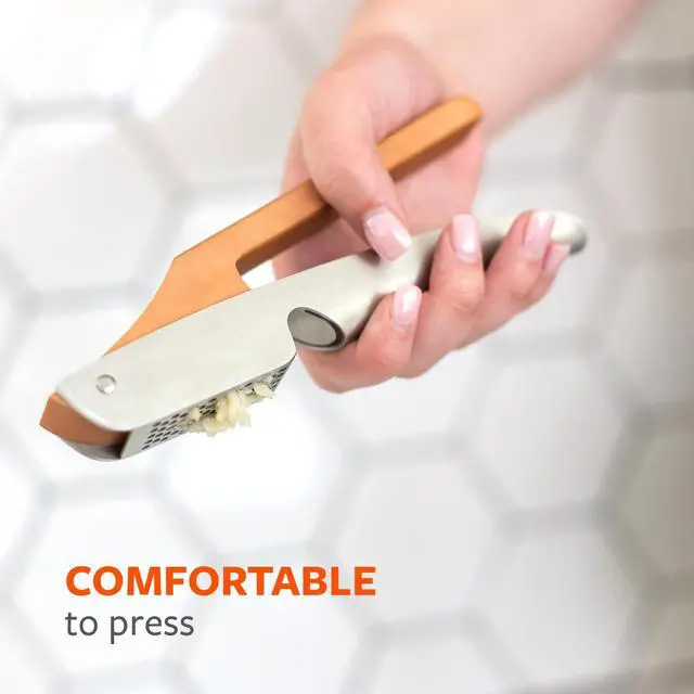 Alt view image 6 of 7 - No Mess Garlic Press - Easy-Clean Stainless Steel - Effortless Crushing and Quick Mess-Free Clean-Up - Integrated Cleaner Scraper, Dishwasher safe