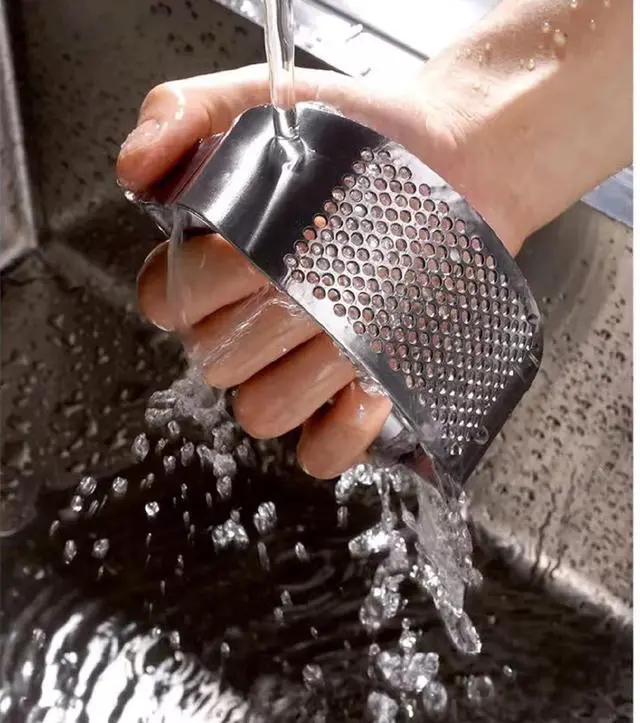 Alt view image 4 of 7 - Garlic press kitchen tool garlic peeler professional ginger crusher ergonomic labor-saving crusher garlic press rocker stainless steel