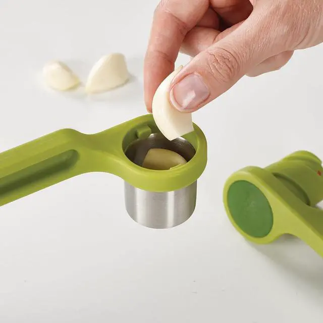 Alt view image 3 of 6 - Helix Garlic Press Mincer Ergonomic Twist-Action Hand Juicer, Stainless Steel