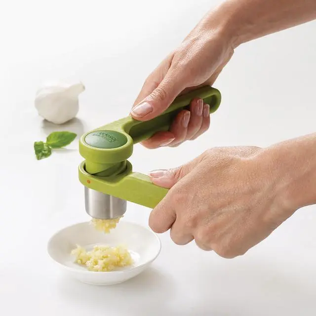 Alt view image 5 of 6 - Helix Garlic Press Mincer Ergonomic Twist-Action Hand Juicer, Stainless Steel