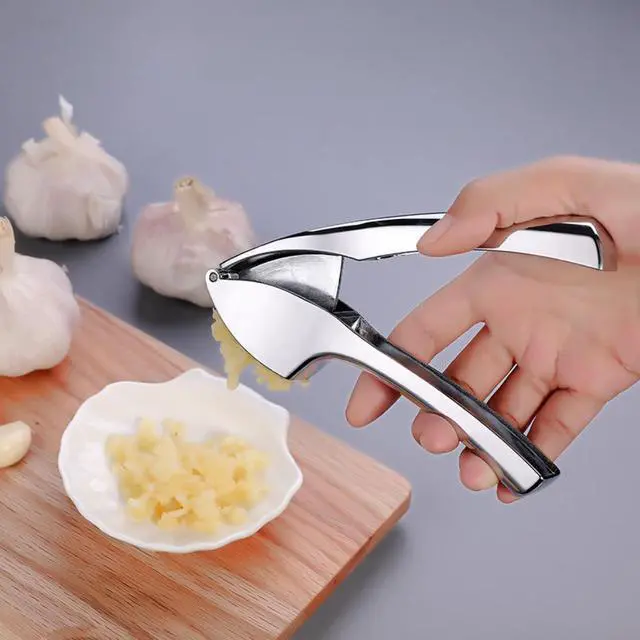 Alt view image 6 of 7 - Heavy Duty Garlic Press, Zinc Alloy Garlic Crusher & Mincer, Easy Squeeze Garlic Press Tool with Ergonomic Handle, Garlic Mincer with Peeler Tube & Cleaning Brush for Kitchen Cooking
