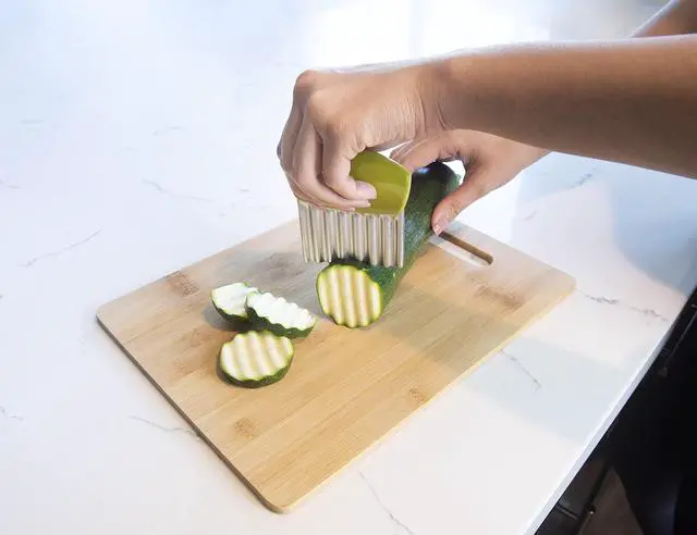 Alt view image 2 of 7 - Crinkle Cutter Knife, Wavy Slicer for Potatoes, Vegetables and Fruits, Great for Kids First Cutting Tool, Fun Kitchen Gadget, Stainless Steel, BPA-Free, Colors May Vary