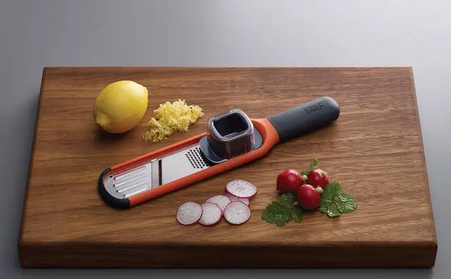 Alt view image 2 of 7 - 2-in-1 Mini Grater & Slicer Compact Kitchen Tool with Sharp Stainless Steel Blades
