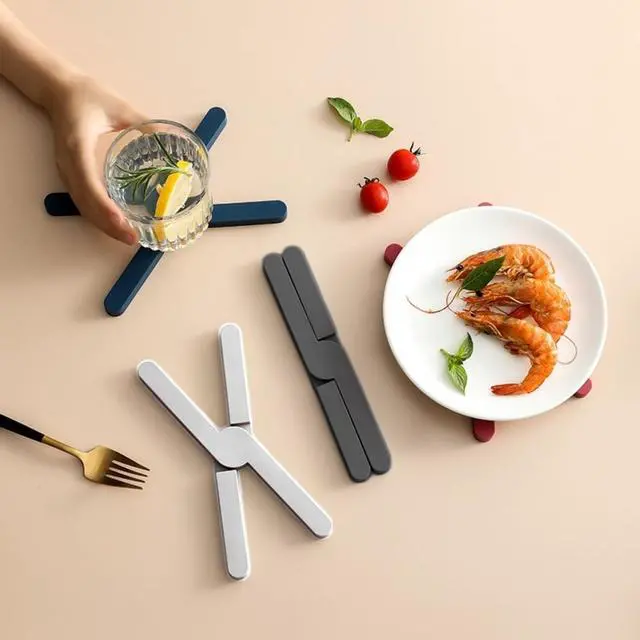 Alt view image 2 of 7 - Set of 3 Expandable Silicone Trivet Mats, Heat Resistant Hot Pot Holders, Multi-Use Kitchen Coasters & Placemats for Hot Pans, Bowls & Dishes