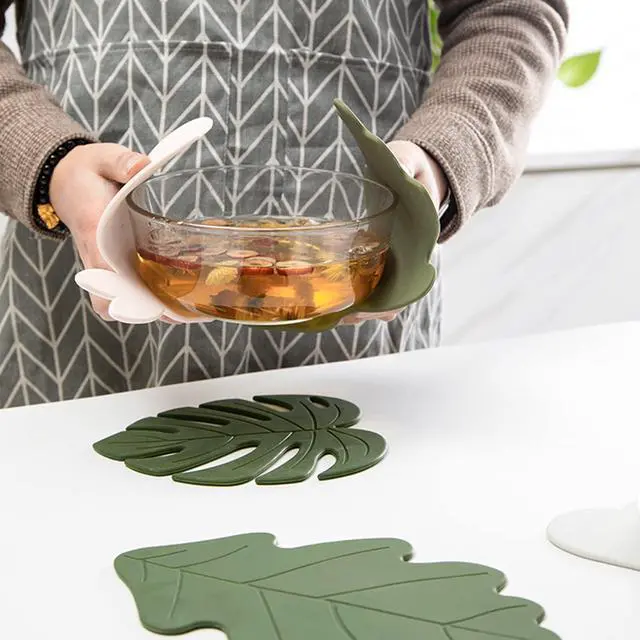 Alt view image 2 of 7 - Silicone Trivet Mat Set of 2, Monstera Pot Holder Hot Pads for Table & Countertop, Soft Rubber Multi-Use Trivets for Pots & Dish, Non Slip Coasters (Large)