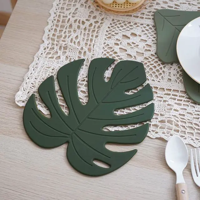 Alt view image 3 of 7 - Silicone Trivet Mat Set of 2, Monstera Pot Holder Hot Pads for Table & Countertop, Soft Rubber Multi-Use Trivets for Pots & Dish, Non Slip Coasters (Large)