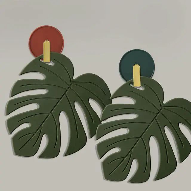 Alt view image 7 of 7 - Silicone Trivet Mat Set of 2, Monstera Pot Holder Hot Pads for Table & Countertop, Soft Rubber Multi-Use Trivets for Pots & Dish, Non Slip Coasters (Large)