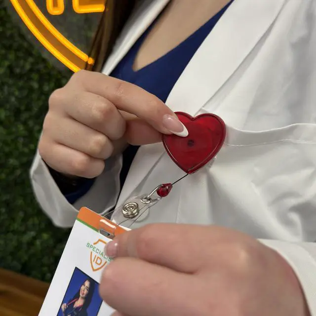 Alt view image 6 of 7 - Bulk 25 Pack - Heart Shaped Retractable Badge Reel with Rotating Swivel Spring Clip - Cute Heavy Duty Name Tag Reels for Nurses, Pediatrics, Teachers, EKG and More by (Red)