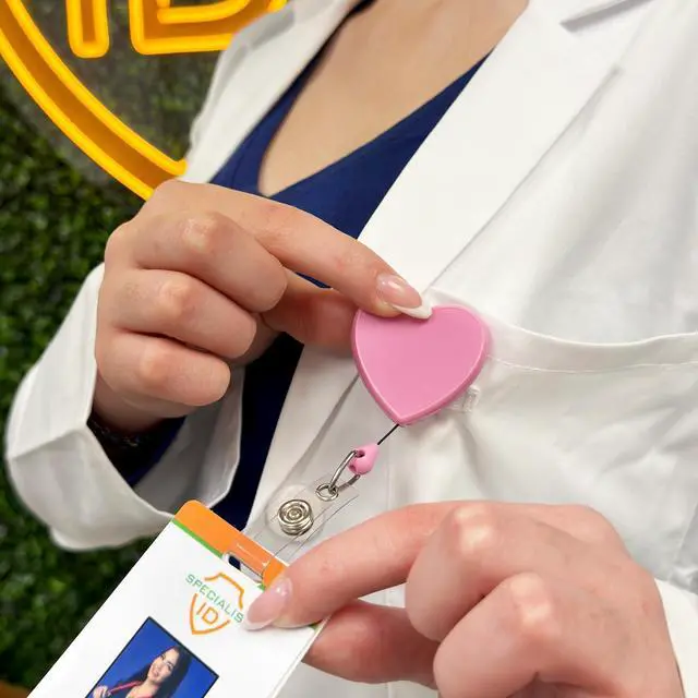 Alt view image 4 of 6 - Bulk 25 Pack - Heart Shaped Retractable Badge Reel with Rotating Swivel Spring Clip - Cute Heavy Duty Name Tag Reels for Nurses, Pediatrics, Teachers, EKG and More by (Pink)