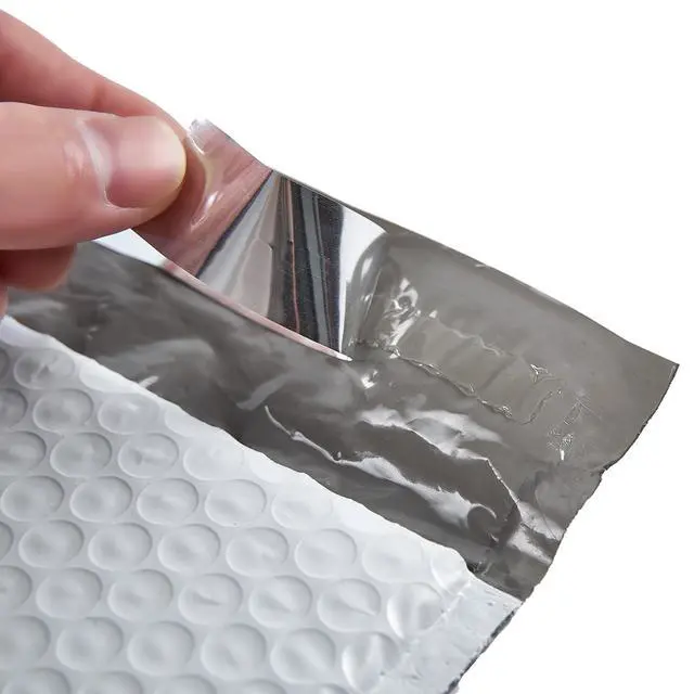 Alt view image 4 of 7 - #4 White Padded Bubble Lined Poly Mailer Bag for Shipping and Packing, Tear-proof, Water-resistant and Lightweight Envelopes, 9.5 x 13.5 inches, Postal Self-Seal Adhesive Opaque Bags. (100)