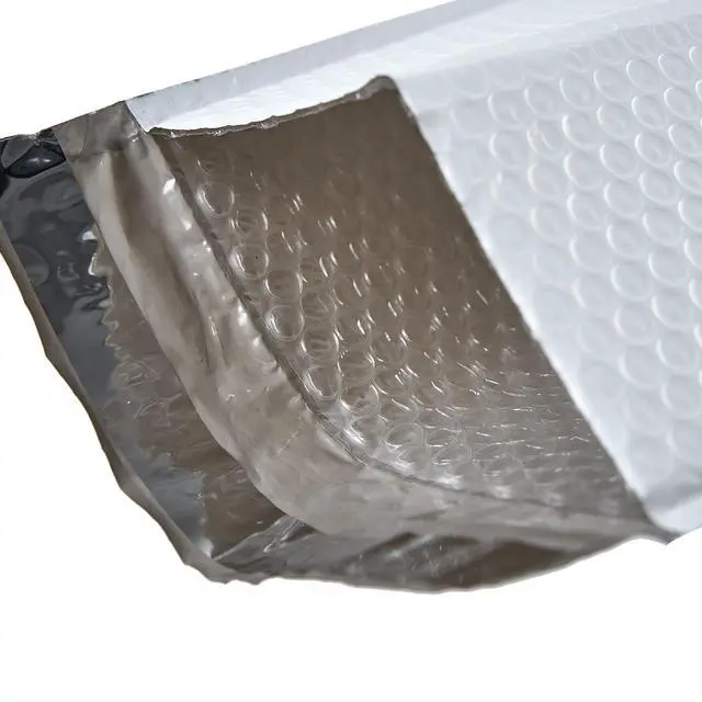 Alt view image 6 of 7 - #4 White Padded Bubble Lined Poly Mailer Bag for Shipping and Packing, Tear-proof, Water-resistant and Lightweight Envelopes, 9.5 x 13.5 inches, Postal Self-Seal Adhesive Opaque Bags. (100)