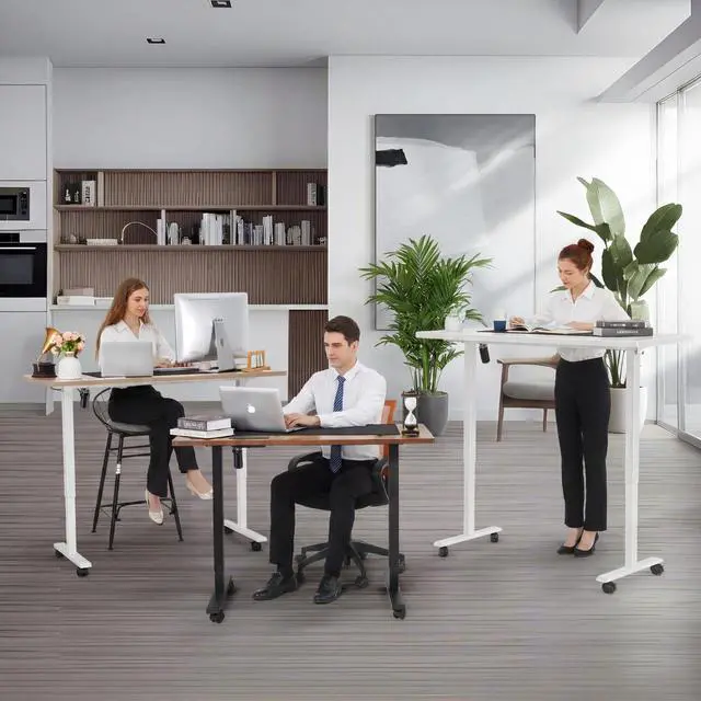 Alt view image 7 of 7 - Electric Standing Desk Adjustable Height, 71 x 28 Inch Sit Stand up Desk with Large Mouse Pad, Double Metal Hook,4 Wheels,4 Memory Preset Heights Home Office Computer DeskBrown